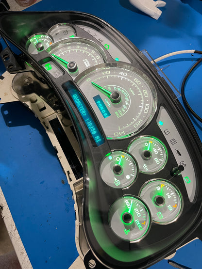 2003-2007 140 MPH 7 Green GLOW NEEDLES Gmc Chevrolet OEM Rebuilt Refurbished Instrument Gauge Cluster Cadillac Escalade , Silverado, Sierra, Tahoe, Denali Suburban, Avalanche, Yukon , W/ Trans Temp (Gold Cadillac Escalade Bezel W/Blue Signals) Speedometer - Speedometerking.com