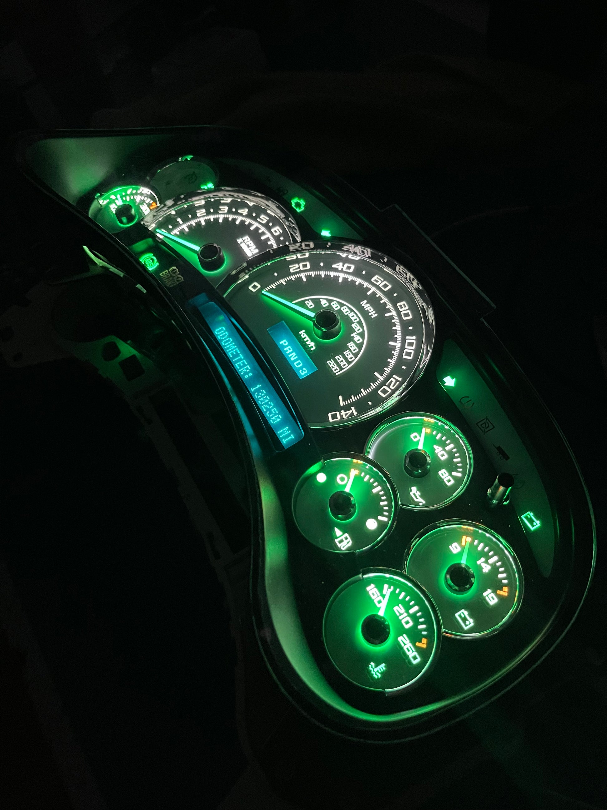 2003-2007 140 MPH 7 Green GLOW NEEDLES Gmc Chevrolet OEM Rebuilt Refurbished Instrument Gauge Cluster Cadillac Escalade , Silverado, Sierra, Tahoe, Denali Suburban, Avalanche, Yukon , W/ Trans Temp (Gold Cadillac Escalade Bezel W/Blue Signals) Speedometer - Speedometerking.com