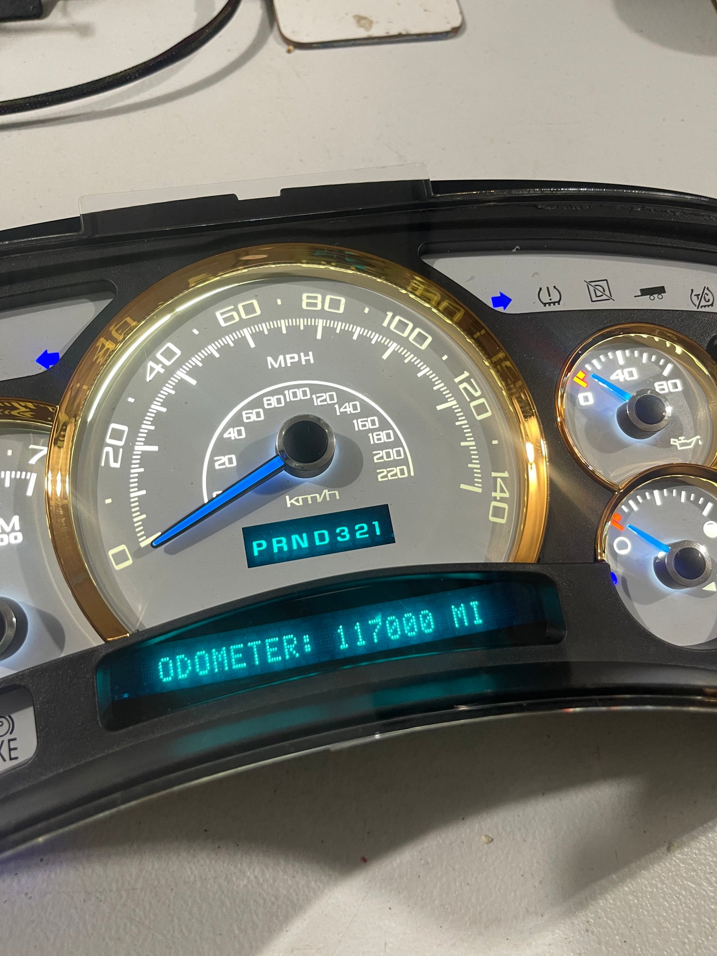 2003-2007 140 MPH 7 GLOW NEEDLES Gmc Chevrolet OEM Rebuilt Refurbished Instrument Gauge Cluster Cadillac Escalade , Silverado, Sierra, Tahoe, Denali Suburban, Avalanche, Yukon , W/ Trans Temp (Gold Cadillac Escalade Bezel W/Blue Signals) Speedometer