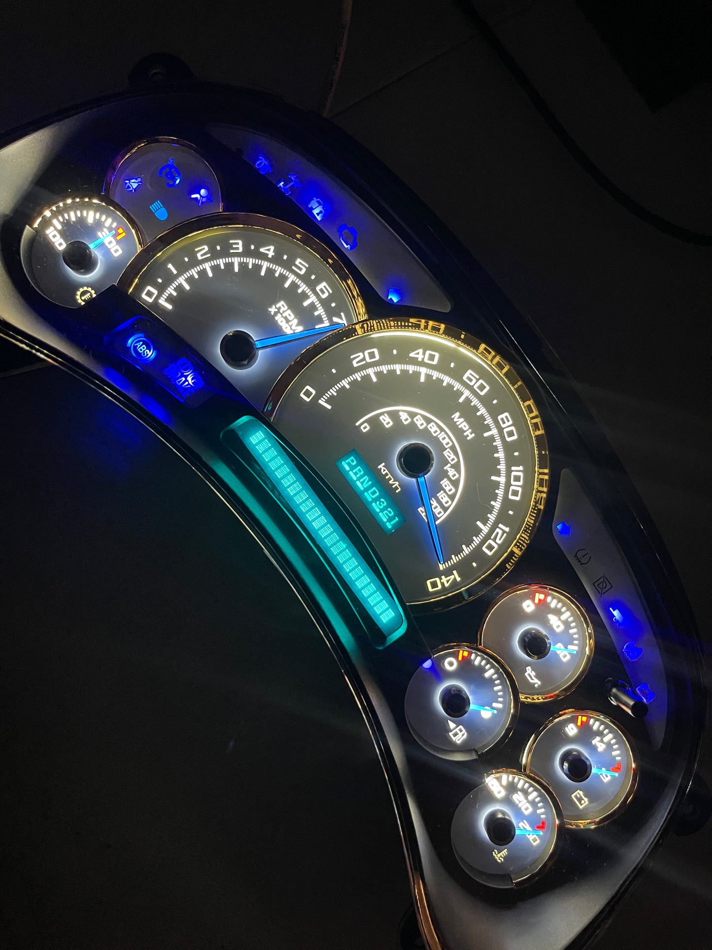 2003-2007 140 MPH 7 GLOW NEEDLES Gmc Chevrolet OEM Rebuilt Refurbished Instrument Gauge Cluster Cadillac Escalade , Silverado, Sierra, Tahoe, Denali Suburban, Avalanche, Yukon , W/ Trans Temp (Gold Cadillac Escalade Bezel W/Blue Signals) Speedometer