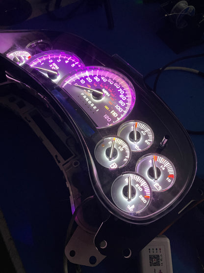 30. 03-07 (APP COLOR CHANGER)  Gmc Chevrolet OEM Rebuilt Refurbished Instrument Gauge Cluster Cadillac Escalade , Silverado, Sierra, Tahoe, Denali Suburban, alanche, Yukon , W/ Trans Temp  Cadillac Escalade Bezel Speedometer  - Speedometerking.com