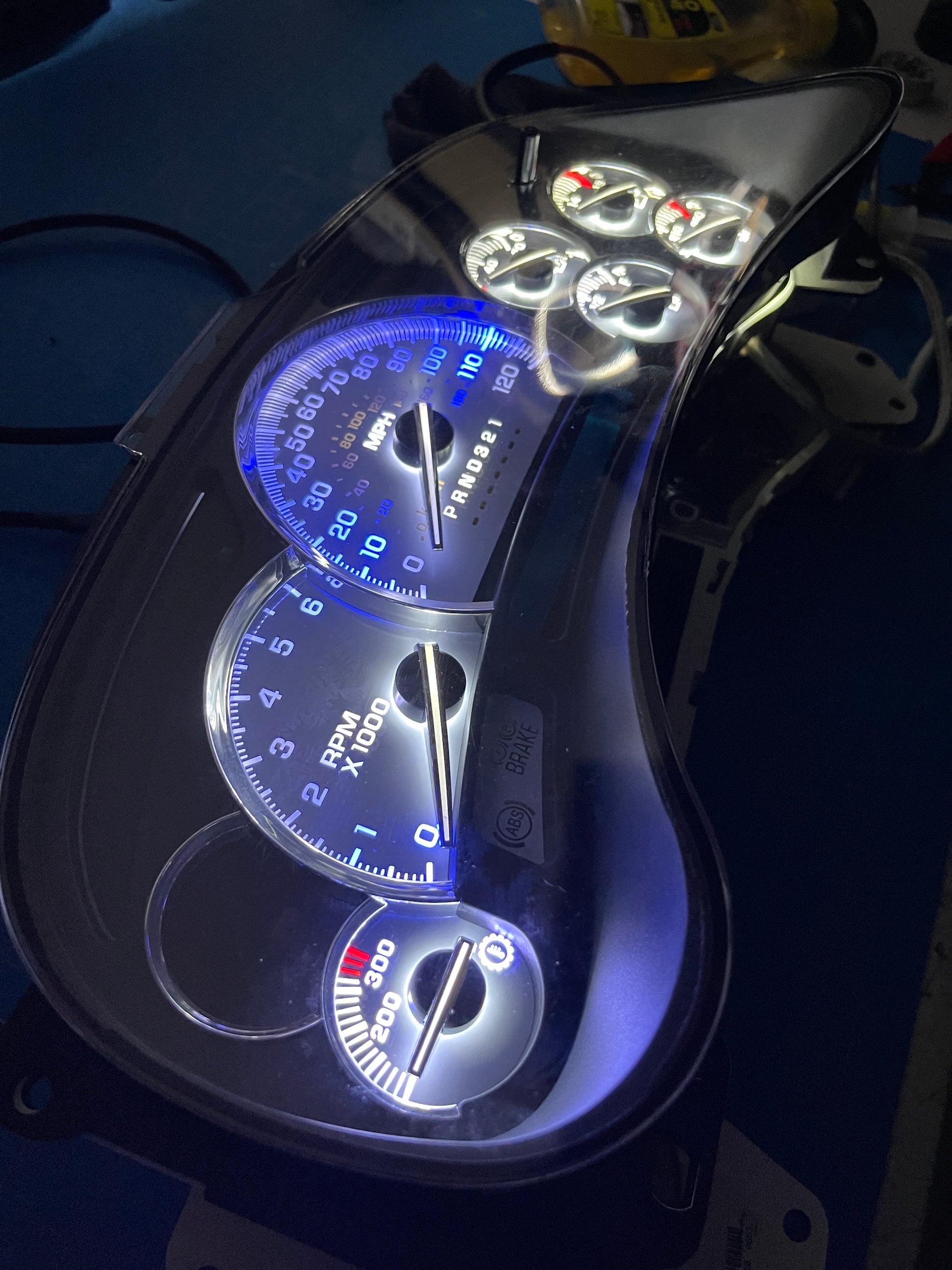 30. 03-07 (APP COLOR CHANGER)  Gmc Chevrolet OEM Rebuilt Refurbished Instrument Gauge Cluster Cadillac Escalade , Silverado, Sierra, Tahoe, Denali Suburban, alanche, Yukon , W/ Trans Temp  Cadillac Escalade Bezel Speedometer  - Speedometerking.com