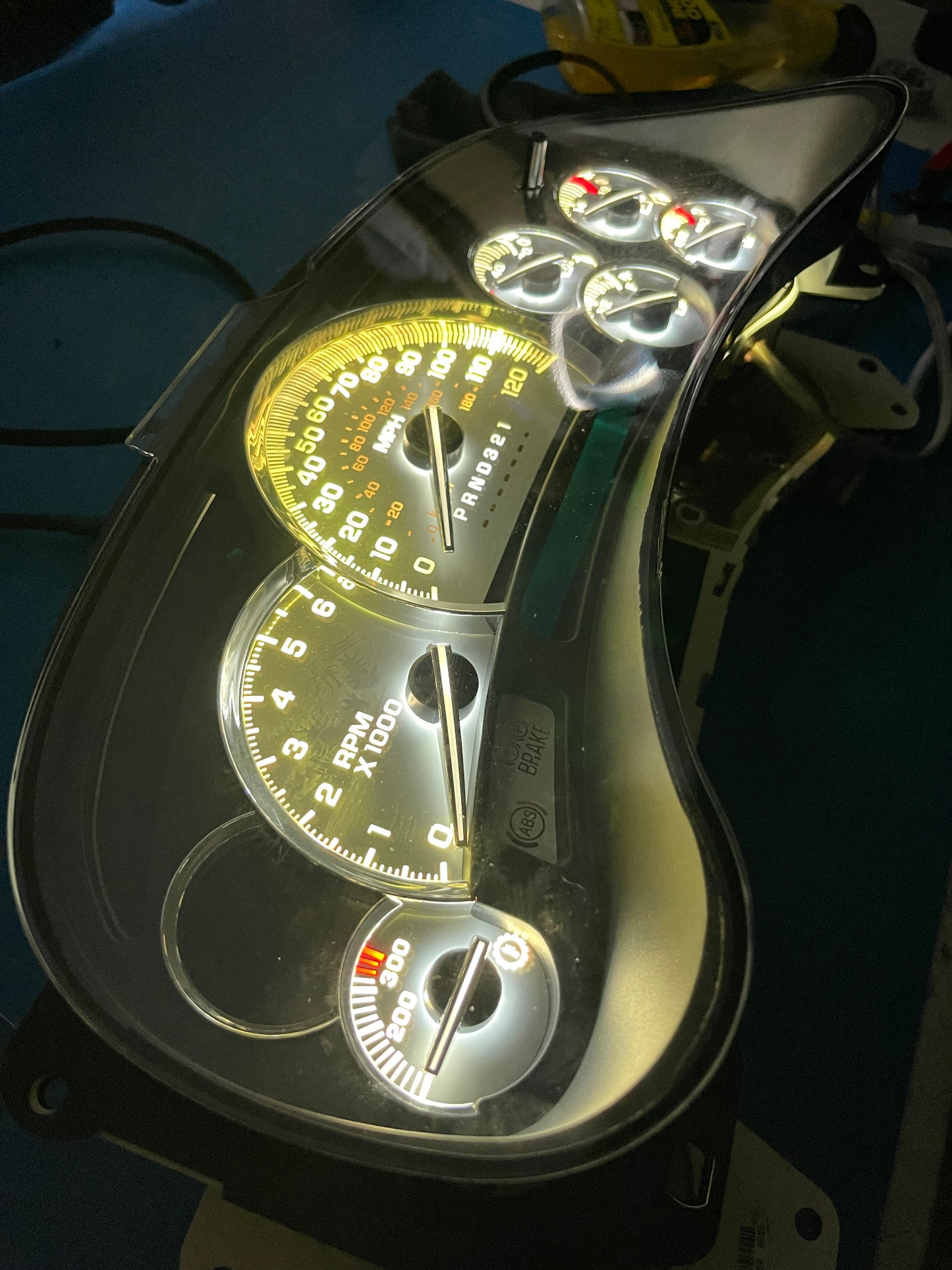 30. 03-07 (APP COLOR CHANGER)  Gmc Chevrolet OEM Rebuilt Refurbished Instrument Gauge Cluster Cadillac Escalade , Silverado, Sierra, Tahoe, Denali Suburban, alanche, Yukon , W/ Trans Temp  Cadillac Escalade Bezel Speedometer  - Speedometerking.com