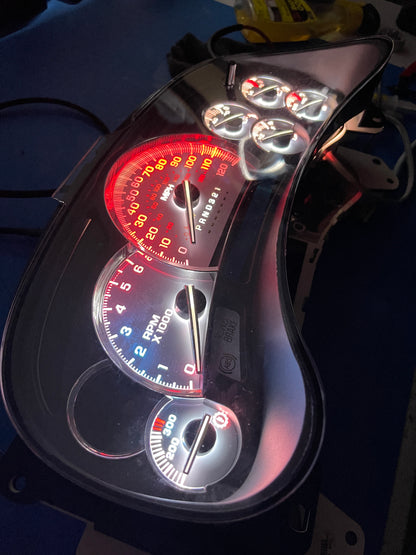 30. 03-07 (APP COLOR CHANGER)  Gmc Chevrolet OEM Rebuilt Refurbished Instrument Gauge Cluster Cadillac Escalade , Silverado, Sierra, Tahoe, Denali Suburban, alanche, Yukon , W/ Trans Temp  Cadillac Escalade Bezel Speedometer  - Speedometerking.com