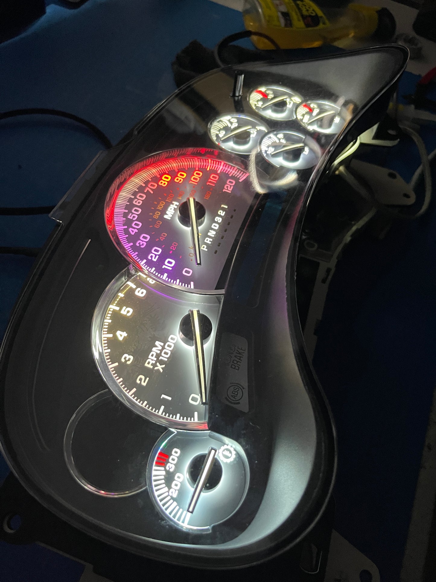 30. 03-07 (APP COLOR CHANGER)  Gmc Chevrolet OEM Rebuilt Refurbished Instrument Gauge Cluster Cadillac Escalade , Silverado, Sierra, Tahoe, Denali Suburban, alanche, Yukon , W/ Trans Temp  Cadillac Escalade Bezel Speedometer  - Speedometerking.com