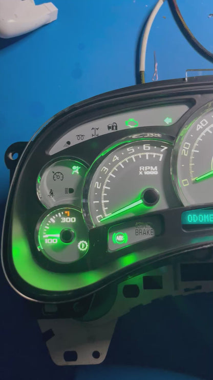 27. 03-07 140 MPH 7 Green GLOW NEEDLES Gmc Chevrolet OEM Rebuilt Refurbished Instrument Gauge Cluster Cadillac Escalade, Silverado, Sierra, Tahoe, Denali Suburban, Avalanche, Yukon, W/ Trans Temp (Gold Cadillac Escalade Bezel W/Blue Signals) Speedometer